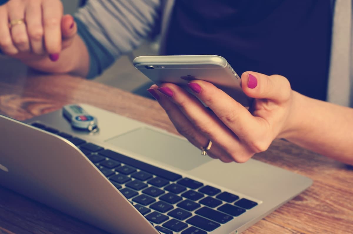 Person calling breakup help phone number for emotional support during relationship crisis