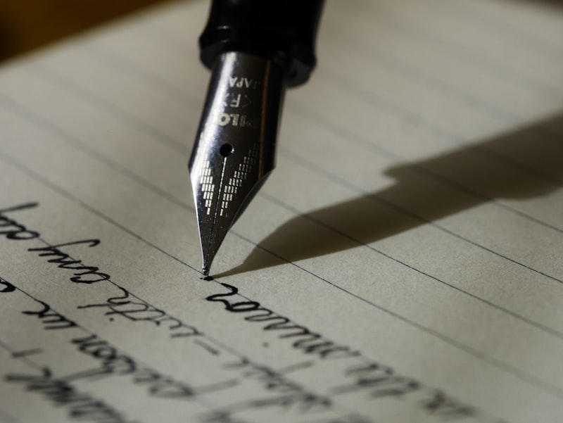 Person writing in journal for self-reflection and healing